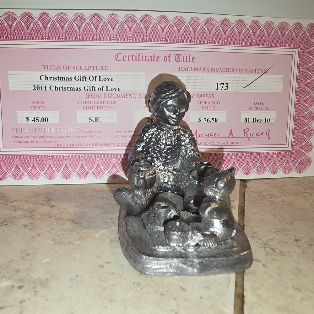 Silver Seated Figure Sculpture with Animal Companion